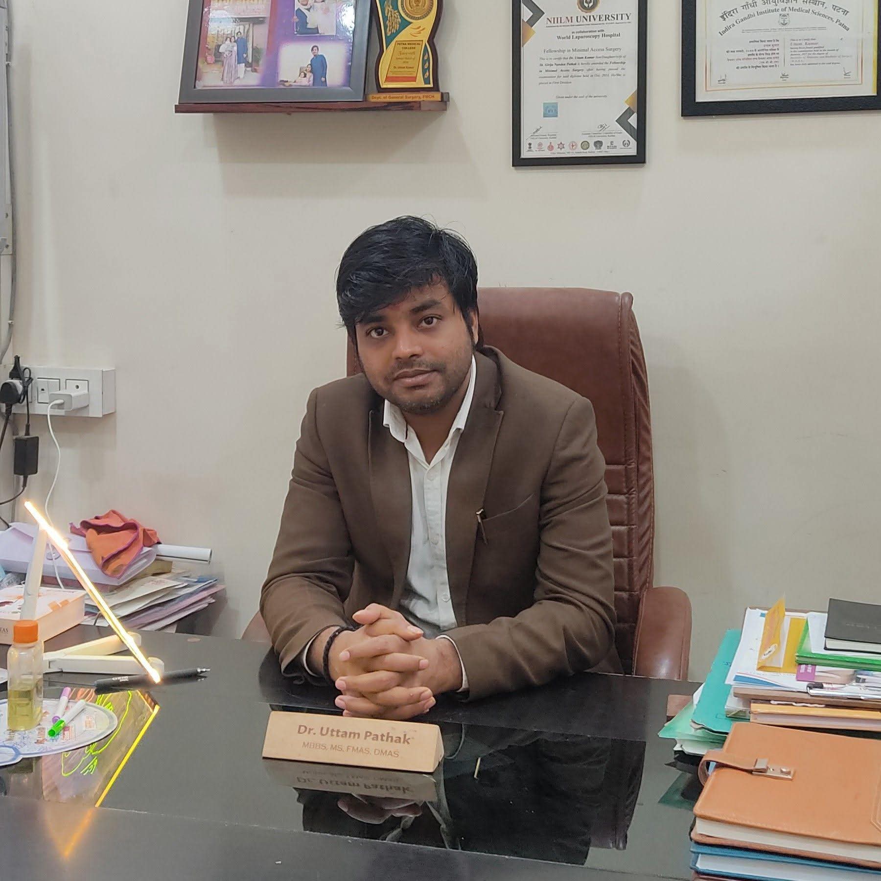 Dr. Uttam Pathak